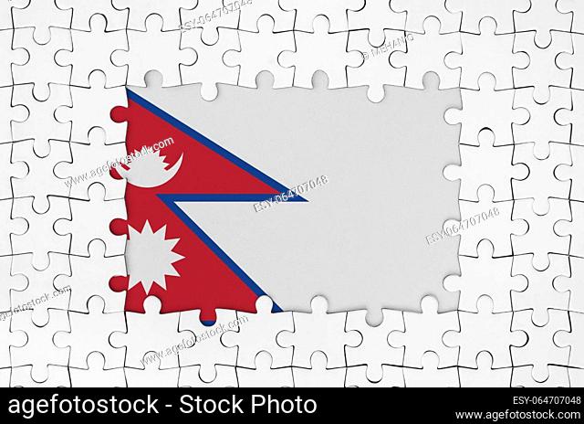 Nepal flag in frame of white puzzle pieces with missing central parts