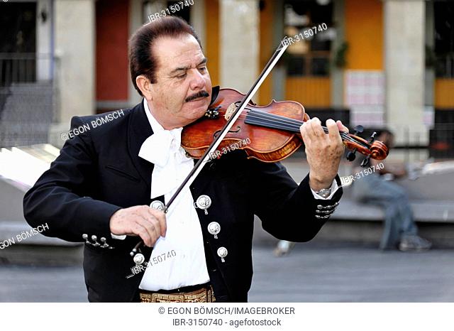 Mexican musician performing in Plaza Garibaldi, Mexico City, Federal District, Mexico