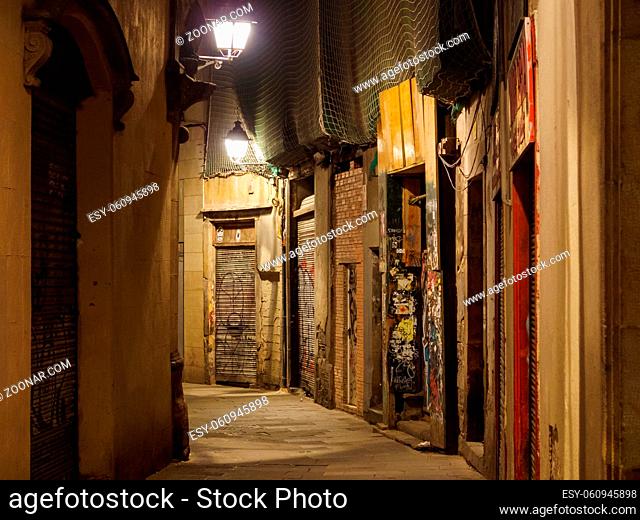 Curving alley in the middle of the night - Barcelona, Catalonia, Spain