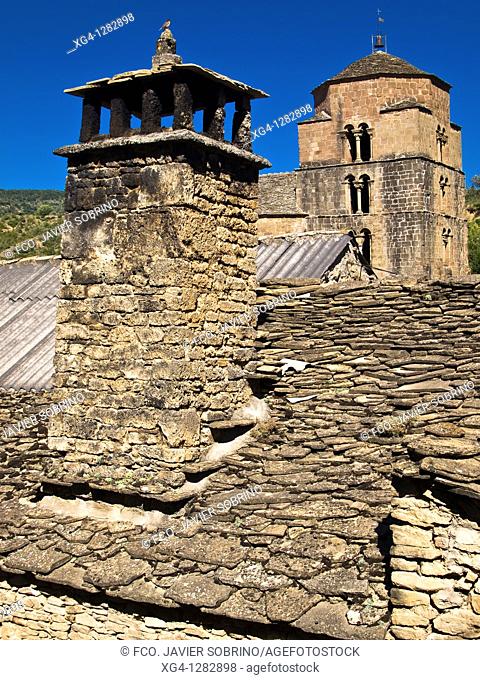 Typical chimney and bell tower of the church of Santa María, Romanesque style of the eleventh century Jaca - Santa Cruz de la Serós - Jacetania - Huesca - Spain