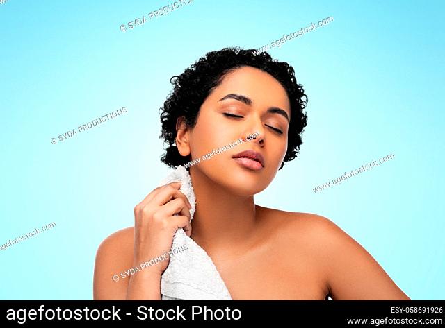 young african american woman with bath towel