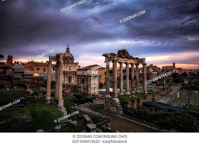 Roman forum taken from the view of the temple of saturn during sunset time