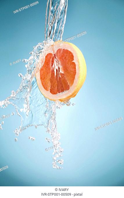 Water Pouring On A Fruit