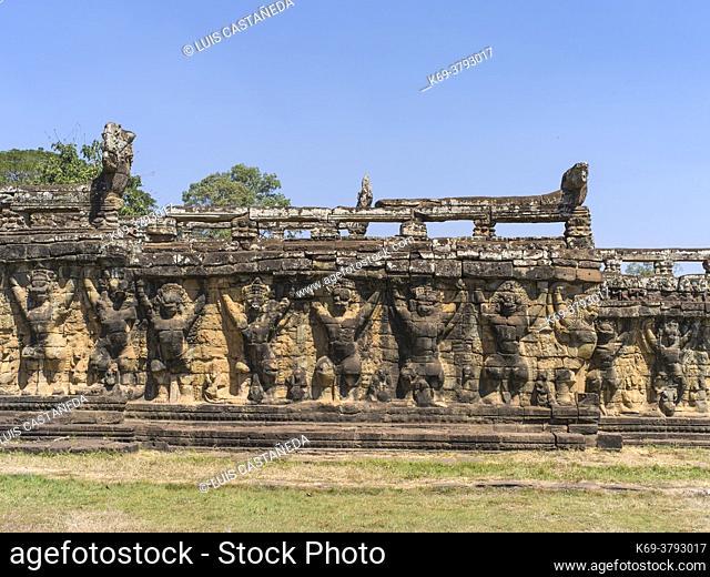 The Terrace of the Elephants is part of the walled city of Angkor Thom, a ruined temple complex in Cambodia. The terrace was used by Angkor's king Jayavarman...
