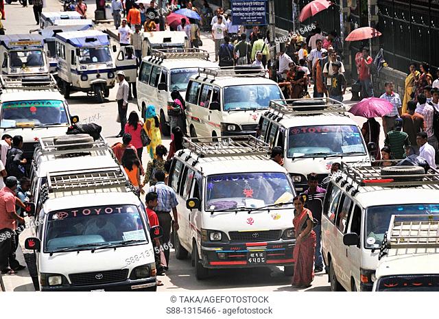 Mini buses are the major public transportation in Kathmandu at Kanthpas street