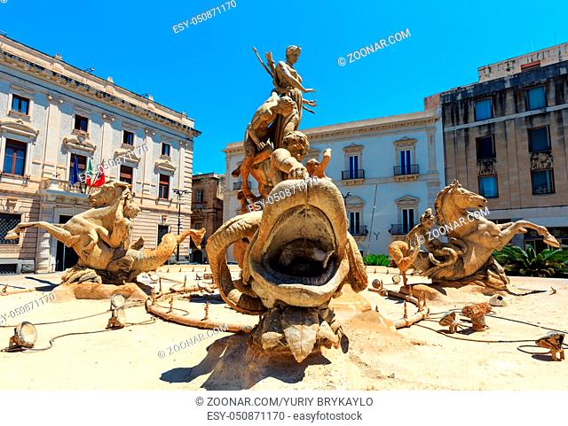 Diana fountain (installed by Giulio Moschetti in 1907) in the center of Siracusa - piazza Archimede. Ortigia island at city of Syracuse, Sicily, Italy