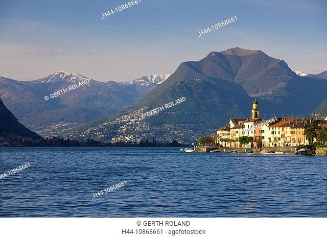 Brusino-Arsizio, Switzerland, canton Ticino, lake, Lago di Lugano, Lake of Lugano, mountain, village, houses, homes, church, evening light, spring, boats