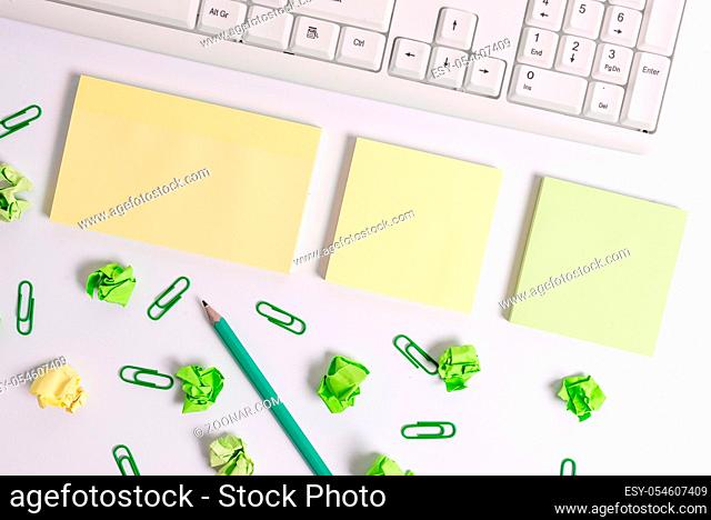 Flat lay above blank copy space sticky notes with business concept. Blank papers for text messages