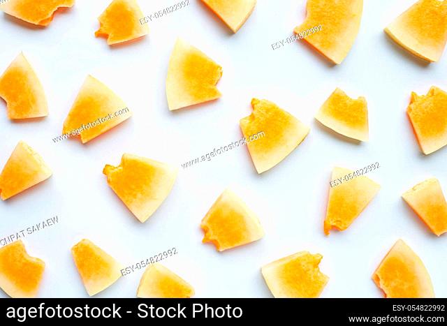 Sliced melon on white background. Top view