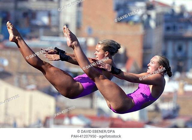 Tonia Couch and Sarah Barrow of Great Britain in action during the women's 10m Synchro Platform diving final of the 15th FINA Swimming World Championships at...
