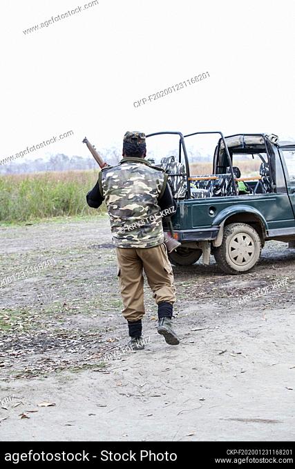 A ranger with a gun in Kaziranga National Park, Assam, India on 8 March, 2019. It is possible to visit the park with a ranger in the Jeep or on elephant early...