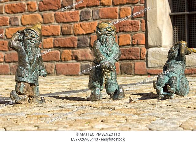 Three dwarfs symbol Wroclaw in Poland acting as the three wise monkey, deaf blind and mute