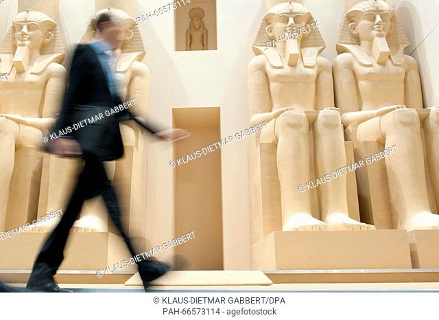 A trade fair visitor walks past small replications of the Abu Simbel temple at the International Tourism Fair - ITB in Berlin,  Germany, 10 March 2016