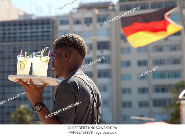 A beach vendor tries to sell his Caipirinha drinks at the Copacabana beach prior to the Rio 2016 Olympic Games in Rio de Janeiro, Brazil, 1 August 2016