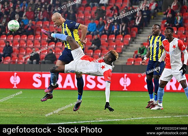 Fenerbahce's Marcel Tisserand, left and Peter Olayinka of Slavia in action during the Europa Conference League second round return match between Slavia Prague...