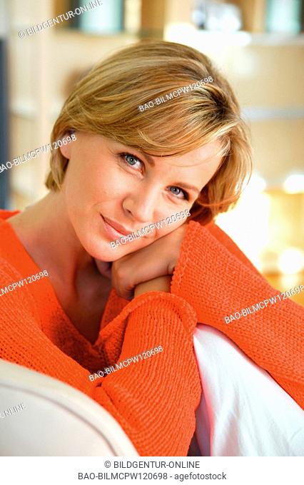 Portrait blonde woman relaxing at home