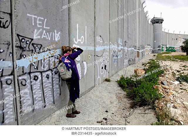 Wall with graffiti, Palestinian side, between Bethlehem, West Bank and Jerusalem, Israel, Middle East