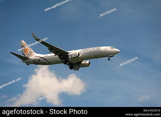 Singapore, Republic of Singapore, Asia - A Myanmar National Airlines Boeing 737-800 passenger aircraft with the registration XY-ALB approaches Changi...