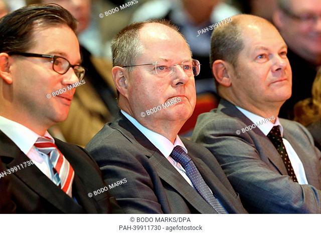 Chairman of the Bavarian SPD Florian Pronold (L-R), SPD chancellor candidate Peer Steinbrueck and Mayor of Hamburg Olaf Scholz take part in the SPD conference...