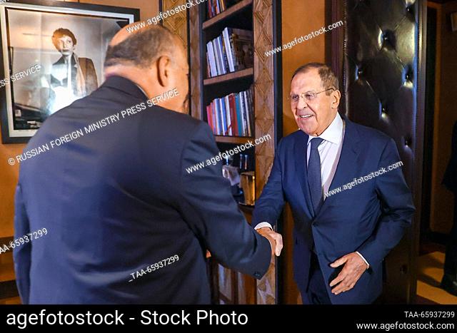 MOROCCO, MARRAKECH - DECEMBER 20, 2023: Russia's Foreign Minister Sergei Lavrov (R) and his Egyptian counterpart Sameh Shoukry shake hands during a bilateral...