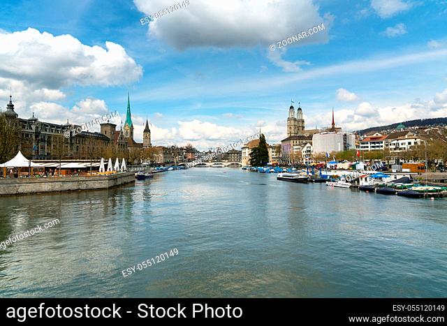 Zurich, ZH / Switzerland - April 8, 2019: Zurich cityscape with the river Limmat during the traditional spring festival of Sechselauten in April