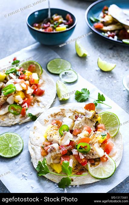 Fish tacos with pineapple and pico de gallo