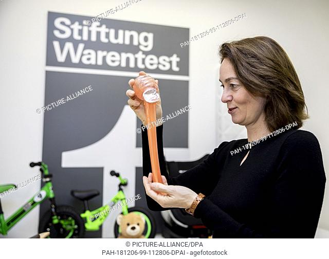 06 December 2018, Berlin: Katarina Barley (SPD), Federal Minister of Justice, is holding the iBase Toy brand slime after a press conference by Stiftung...