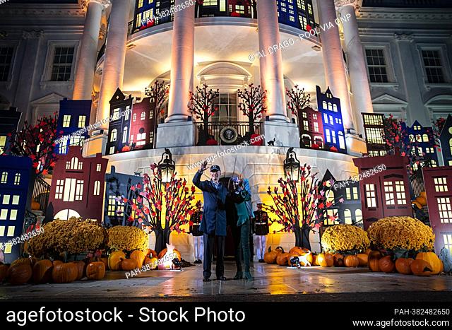 US President Joe Biden and First Lady Jill Biden greet guests during a Halloween event on the South Lawn of the White House in Washington, DC, US, on Monday