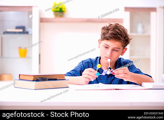 The kid preparing for school at home