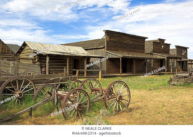 Old western wagons, restored storefronts, homes and saloons from the pioneering days of the Wild West at Cody, Montana, United States of America, North America