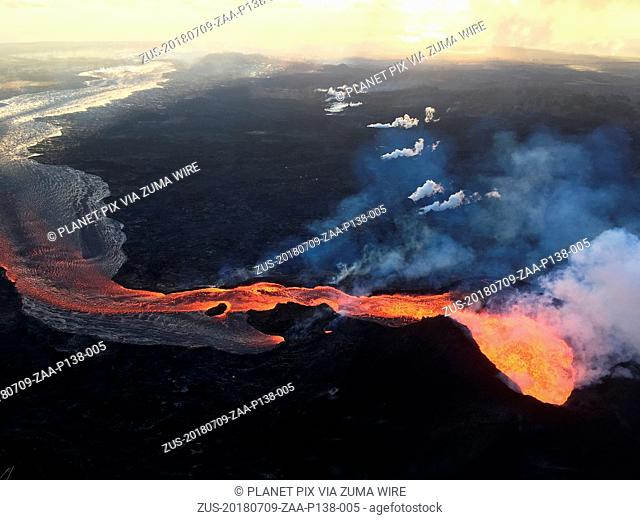 July 9, 2018 - Halemaumau, HI, United States of America - Lava flows toward the ocean from the Kilauea volcano July 9, 2018 in Hawaii