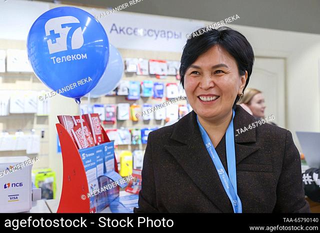RUSSIA, LUGANSK - DECEMBER 15, 2023: Sales Director Vera Zezikova visits an outlet of +7Telecom, a new local service provider set to expand from the capital of...