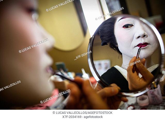 Toshiyu applying makeup in her Okiya (geisha house).Geisha from geisha's distric of Miyagawacho.Kyoto. Kansai, Japan