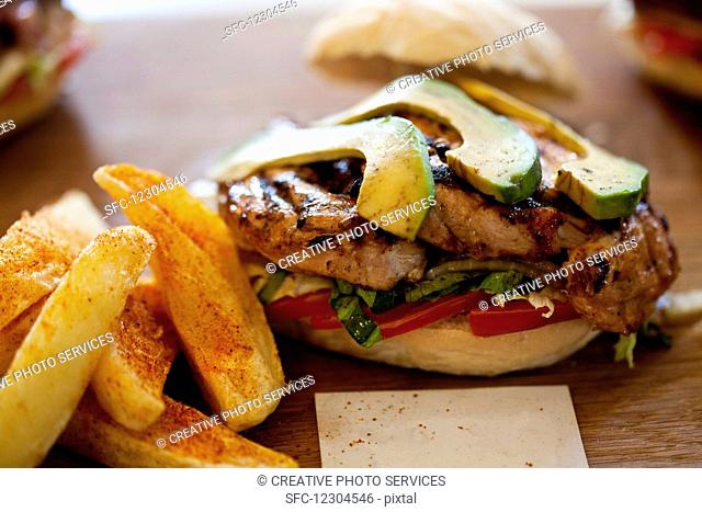 Chicken and Avocado Prego Roll with potato wedges