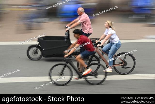 15 July 2022, Hessen, Frankfurt/Main: Visitors to the international bicycle trade show Eurobike are out and about with test bikes at the Frankfurt exhibition...