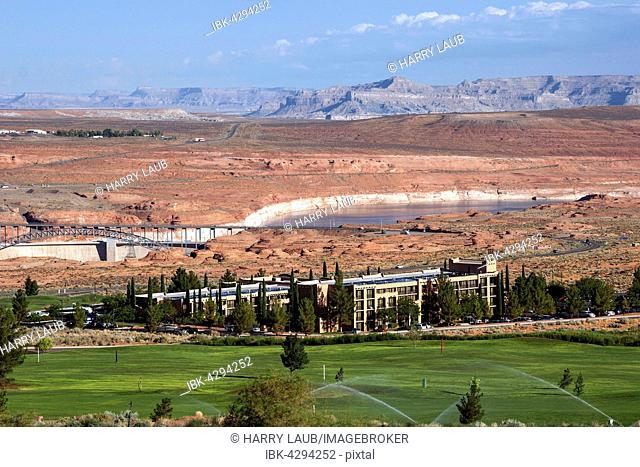 Golf course and Marriot Hotel, Glen Canyon Dam and Lake Powell behind, Page, Arizona, USA