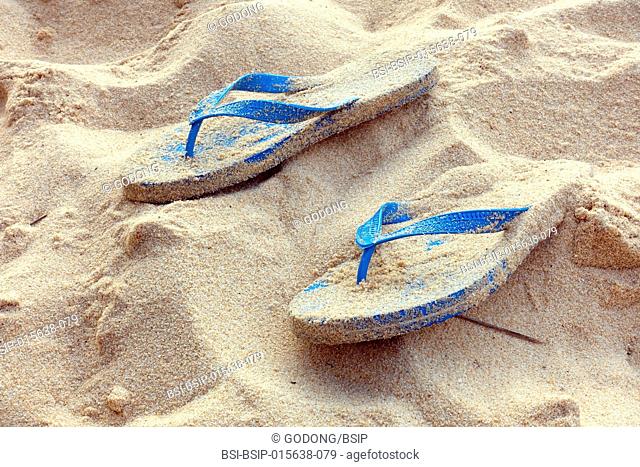 Close up of flip flops on beach. Phu Quoc. Vietnam