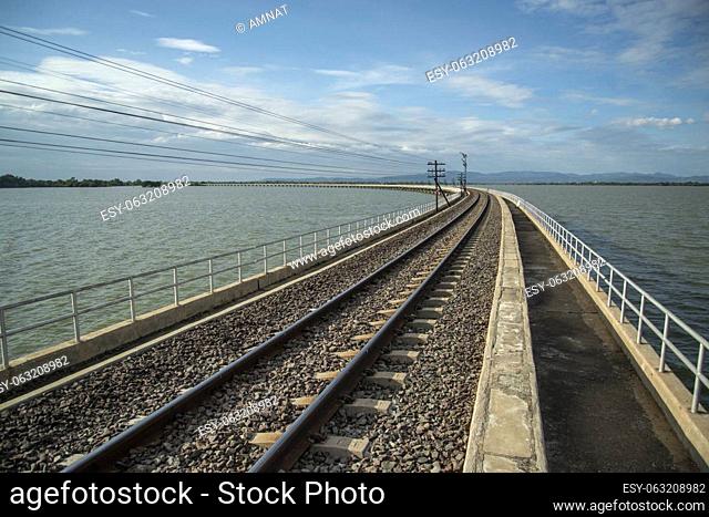 The Train bridge of the Rot Fai Loi Nam Train or floating train line at the Pa Sak Jolasid Dam in near the City of Lopburi in the Province of Lopburi in...