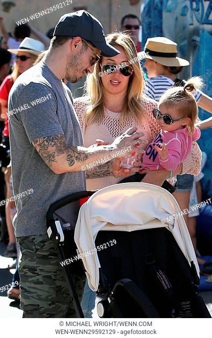 Haylie Duff with her daughter and partner, Matt Rosenberg, with former brother-in-law Mike Comrie and son Luca at the Studio City Farmers' Market in Los Angeles