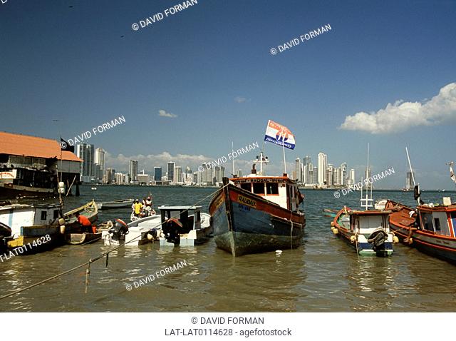 View of city. central amercia. harbour. boats moored