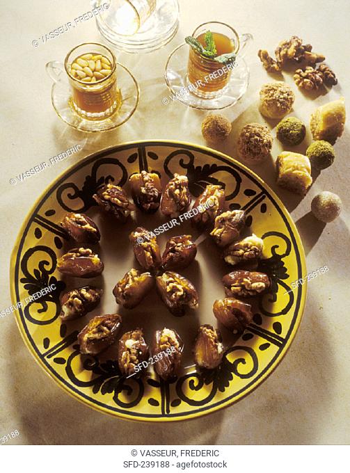 Tunisian walnut-stuffed dates and assorted chocolates