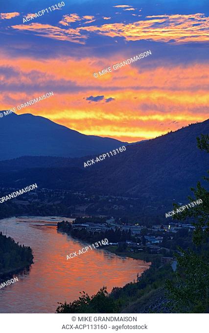 Sunset reflecting off the Columbia River in the Columbia Valley flanked by the Monashee Mountains in the West and the Selkirk Mountains in the East, Trail