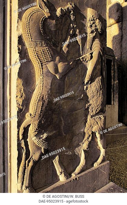 Bas-relief of a hero fighting a monster from a bird's head, jamb of the door of the Throne Room or the Hundred Columns, Persepolis (UNESCO World Heritage List