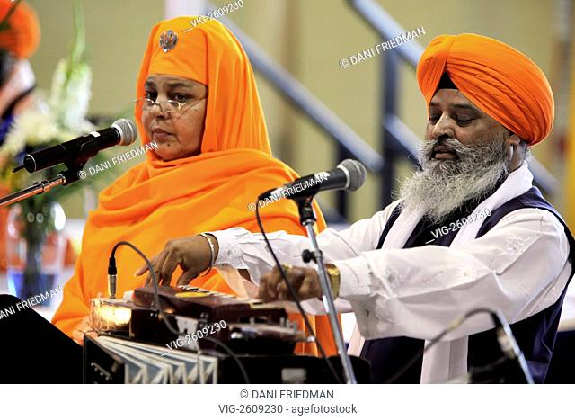 CANADA, TORONTO, 24.04.2011, Sikh musicians perform kirtans (religious songs) to celebrate the Sikh holiday of Vaisakhi. Vaisakhi is one of the most significant...