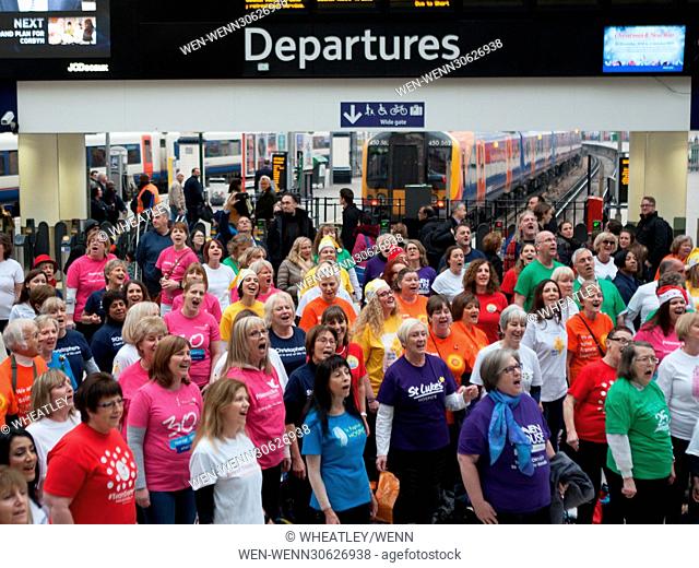 London Hospices Choir Flash Mob Waterloo promoting Christmas single ‘The Living Years’ at Waterloo Station Featuring: Atmosphere, View Where: London, England