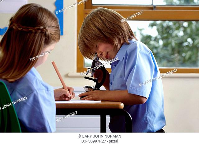 School children working on an assignment in classroom