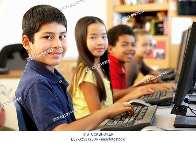 Schoolchildren working on computers