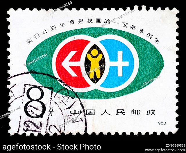 A stamp printed in China shows the family plan policy, circa 1983