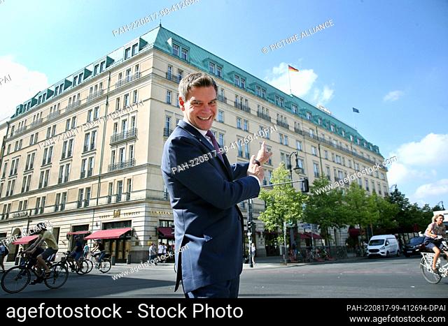 08 August 2022, Berlin: Michael Sorgenfrey, director of the Hotel Adlon, stands in front of the luxury hotel on Pariser Platz