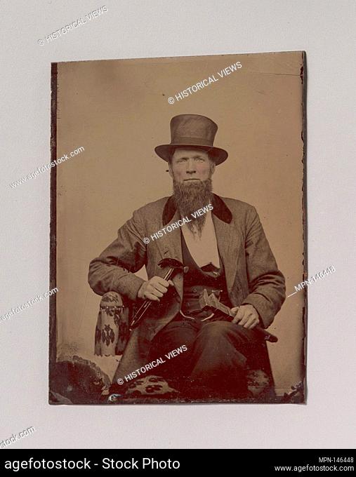 [Man in Top Hat Holding a Hammer and Wrench]. Artist: Unknown (American); Date: 1860s- early 70s; Medium: Tintype; Dimensions: Image: 8